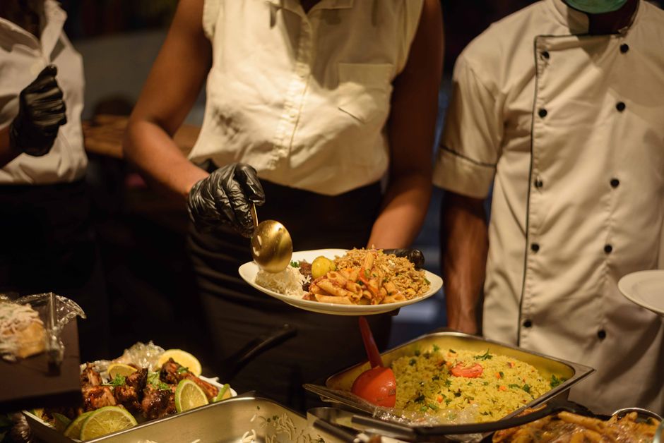 Professional catering staff serving exquisite food